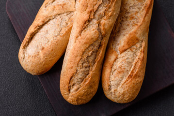 Crispy mini baguette with seeds and grains, salt and spices
