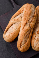 Crispy mini baguette with seeds and grains, salt and spices