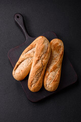 Crispy mini baguette with seeds and grains, salt and spices