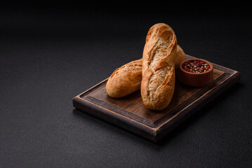 Crispy mini baguette with seeds and grains, salt and spices