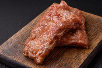 Raw pork or beef ribs in honey sauce with salt, spices