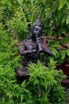 UTTARADIT, THAILAND - July 2, 2024: The Status of Phra Aphai Mani and Sunthorn Phu for display to decorate the garden with natural background at Thailand.