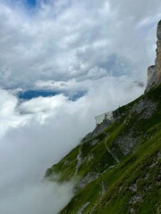 Futuristic building on a mountain side in the Alps