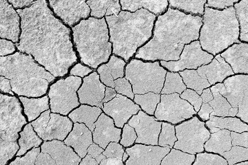 Wall texture soil dry crack pattern of drought lack of water of nature brown old broken background.