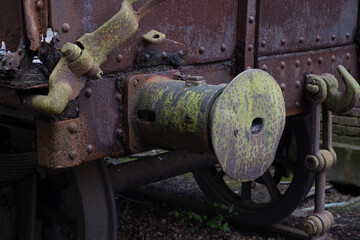 Industrial machines from an old abandoned coal mine, old and rusty.