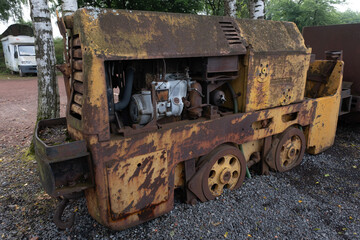 Industrial machines from an old abandoned coal mine, old and rusty.