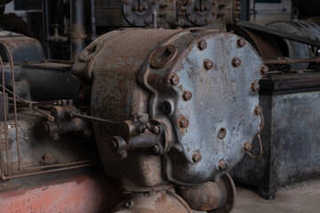Industrial machines from an old abandoned coal mine, old and rusty.