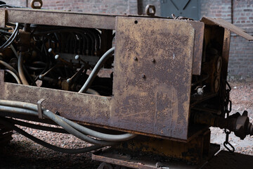 Industrial machines from an old abandoned coal mine, old and rusty.