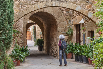 Arcades. Medieval village of Monells. Girona, Costa Brava. Catalunya. Spain