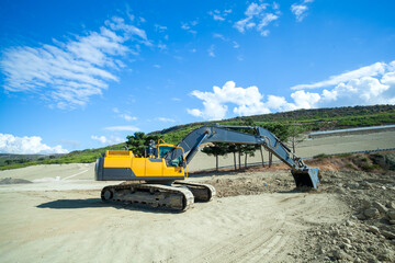 Large excavator is working on construction site 