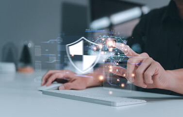 A person interacts with a digital interface showcasing AI cybersecurity concepts, emphasizing data protection and technological security measures.