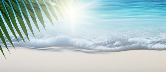 Abstract white sand beach background with a shadow of a palm leaf, sun reflecting on the water; a beautiful summer vacation copy space image banner.