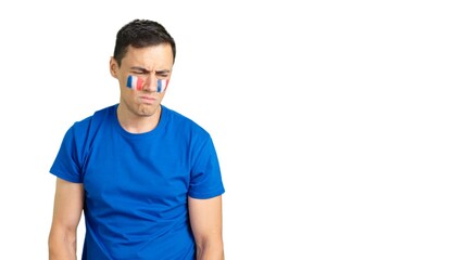 Fototapeta premium French supporter during an exciting march that is ultimately lost