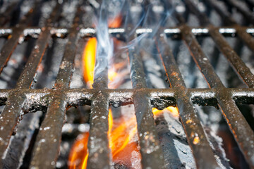 Fototapeta premium Preheating a gas grill to clean and sanitize before grilling.