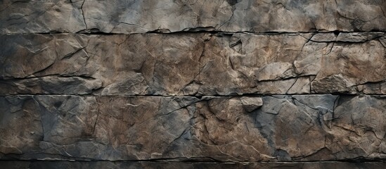 Rugged stone texture providing a grungy background for the copy space image.