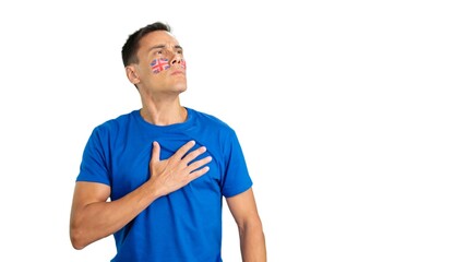 Fototapeta premium Man listening to the United Kingdom national anthem with solemnity