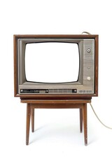 An old television sitting on top of a wooden stand, great for nostalgic scenes or vintage decor inspiration