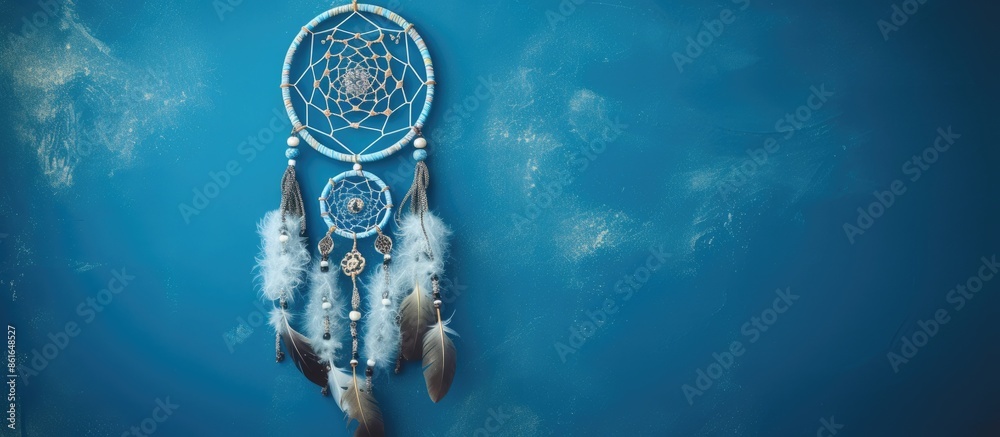 Aufkleber top view of a dream catcher feature asian attributes on a blue background with copy space image avai