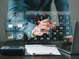 Businessman with meeting schedule, calendar, marking due date, appointment calendar, reminder for...