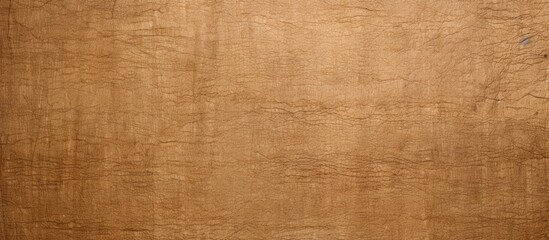 Brown paper or cardboard provides a textured backdrop for designs with copy space image.