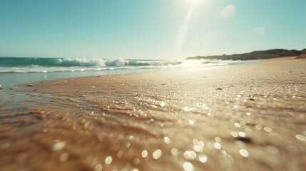 Warm sunlight illuminates a sandy beach