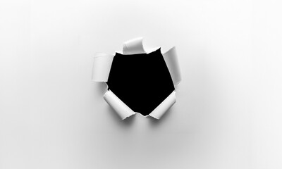 Torn Hole in White Paper with Black Background