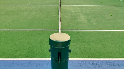 Tennis court with balls, net and lines for sport background