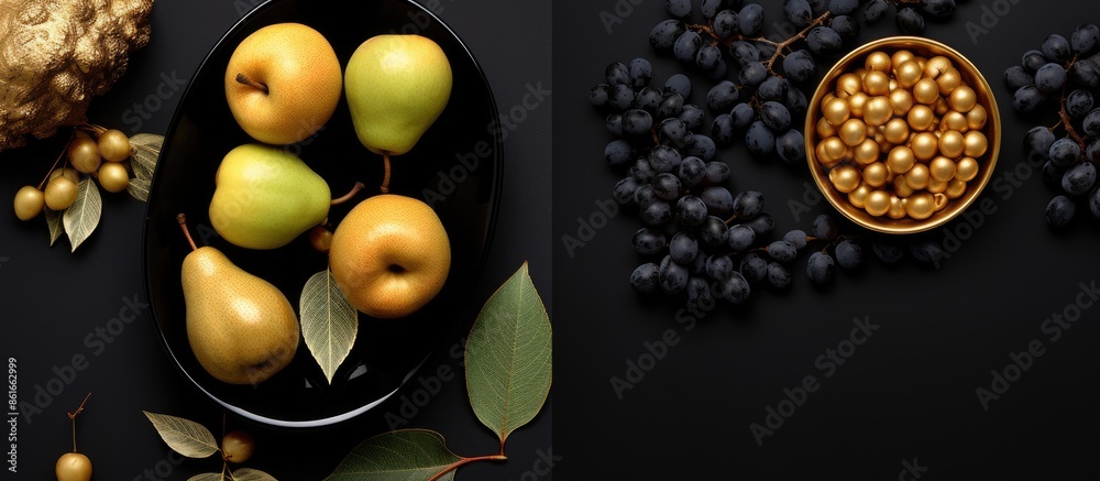 Poster Golden fruits set on black table in flat lay composition with copy space image available.