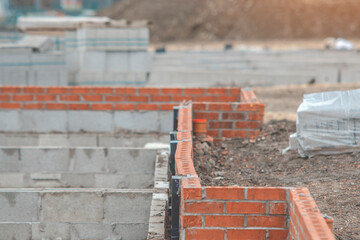 Brick and Concrete Foundation Construction on a Residential Building Site
