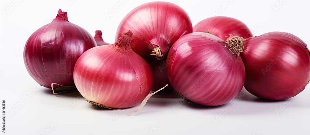 Aufkleber red onions against white background in copy space image.