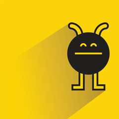 cute monster character with shadow on yellow background
