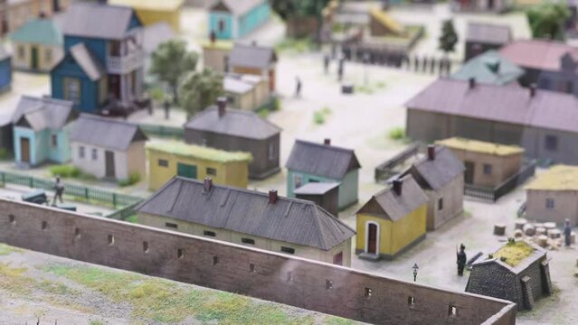 Historical diorama of ancient Russian fortification with garrison of soldiers. Exhibition at Museum of Military History. Miniature and figurines