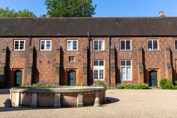 Inner courtyard with fountain and entrance to Fulham palace, London, England