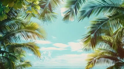 Naklejka premium Coconut palms frame the ocean view with their lush greenery