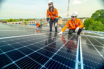 engineer man inspects construction of solar cell panel or photovoltaic cell by electronic device....