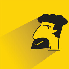 beard man with shadow on yellow background