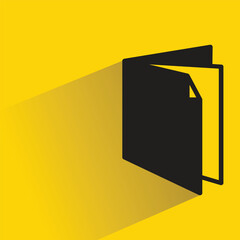 book icon with shadow on yellow background