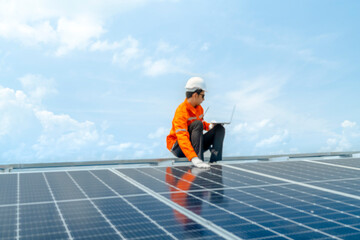 engineer man inspects construction of solar cell panel or photovoltaic cell by electronic device....