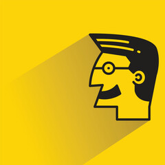 male face icon with shadow on yellow background