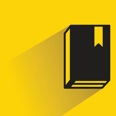 book icon with shadow on yellow background