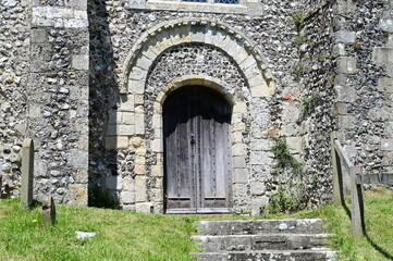 Obraz premium Closed double doors of a Norman church in the UK. 