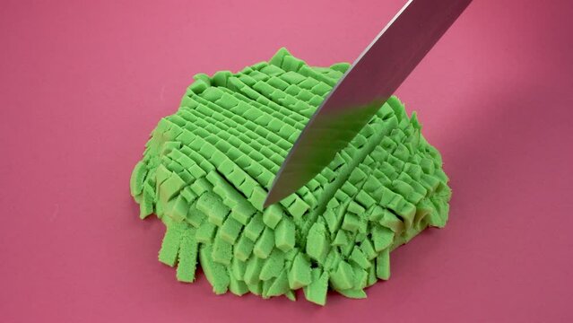 Very Satisfying and Relaxing Kinetic Sand ASMR video. Cutting anti stress macro close up colorful Kinetic Sand with a Knife. ASMR sounds.