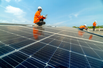 engineer man inspects construction of solar cell panel or photovoltaic cell by electronic device....