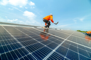 engineer man inspects construction of solar cell panel or photovoltaic cell by electronic device. Industrial Renewable energy of green power. factory worker working on tower roof.