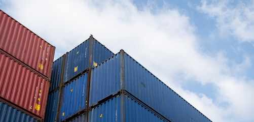 Fototapeta premium Background of container box stack for freight cargo shipping. Logistics import export business at factory warehouse.