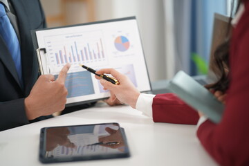 Group of business professionals work together and discuss marketing strategies. Business teams have planning skills regarding long-term financial plans. Close-up pictures