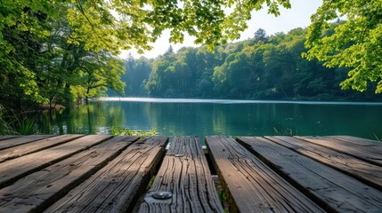 tranquil summer lake and green forest viewed from empty wooden table highquality photo