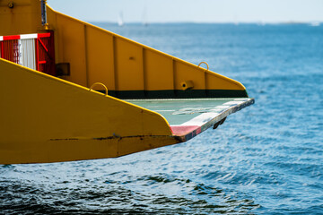 Ramp of a car ferry approaching the port.