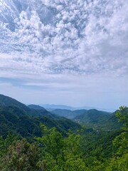 Naklejka premium clouds over the mountains