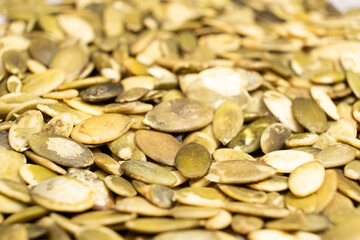 Peeled pumpkin seeds, kernels close-up